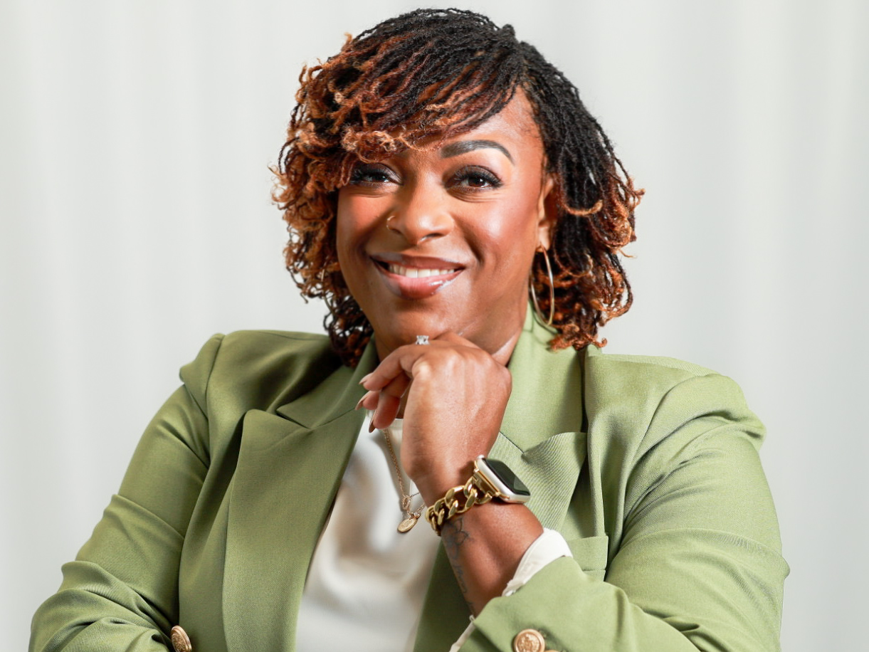 Melissa Douglass in a sage blazer